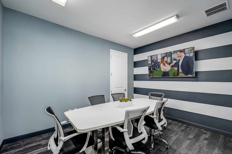One of the meeting rooms at Mango Space coworking land o' lakes